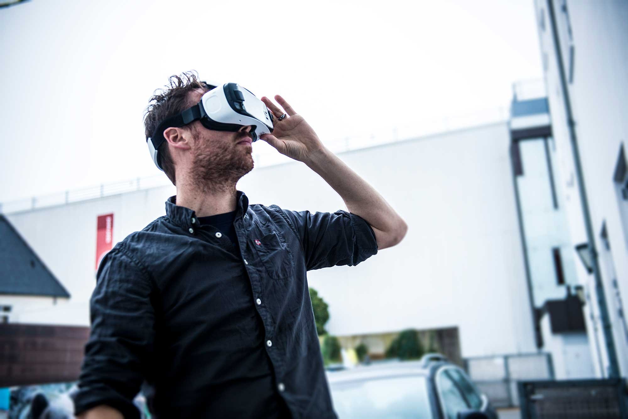 Man wearing a VR headset on a construction site